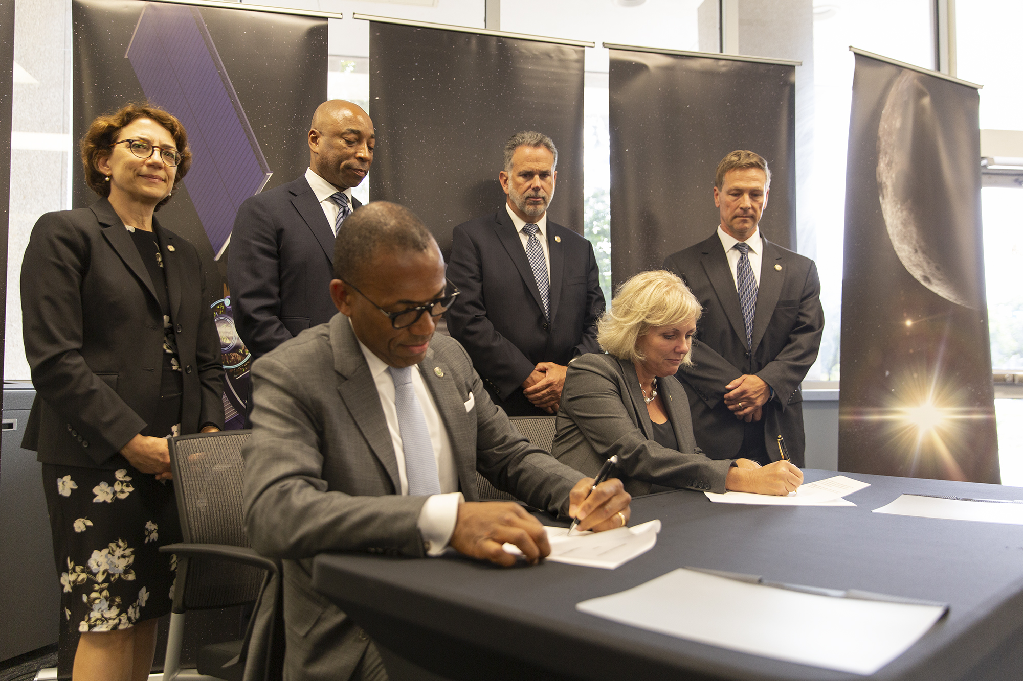 NTSB Chair Jennifer Homendy and FAA Acting Administrator Billy Nolen sign MOA at NASA's Mission Control Center in Houston.